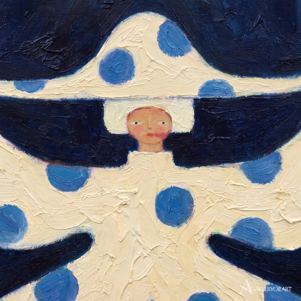 close-up-of-blue-dots-on-a-cream-hat-in-folk-art-style-with-blue-and-cream-colors