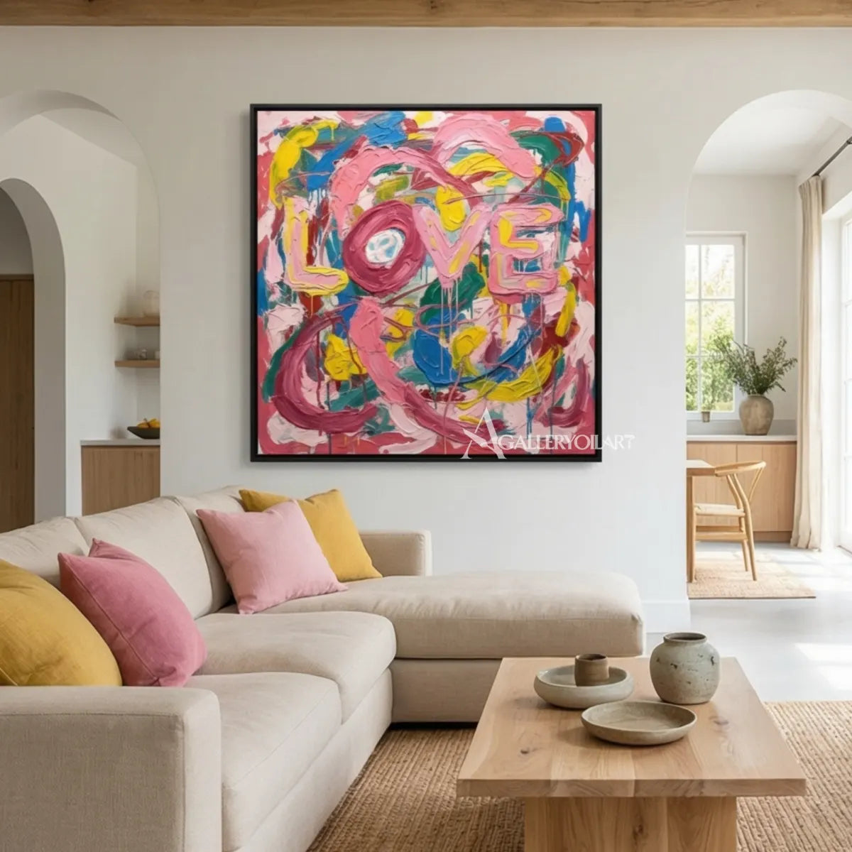 Pop art painted LOVE letters in pink, blue, yellow, green, and white wall art in detail