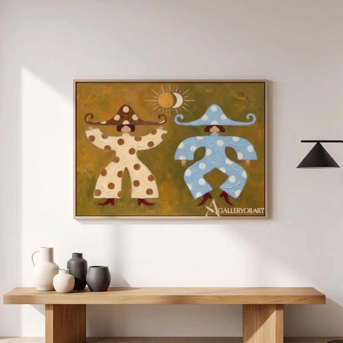folk-art-pair-of-cream-and-blue-figures-on-brown-above-a-wood-console