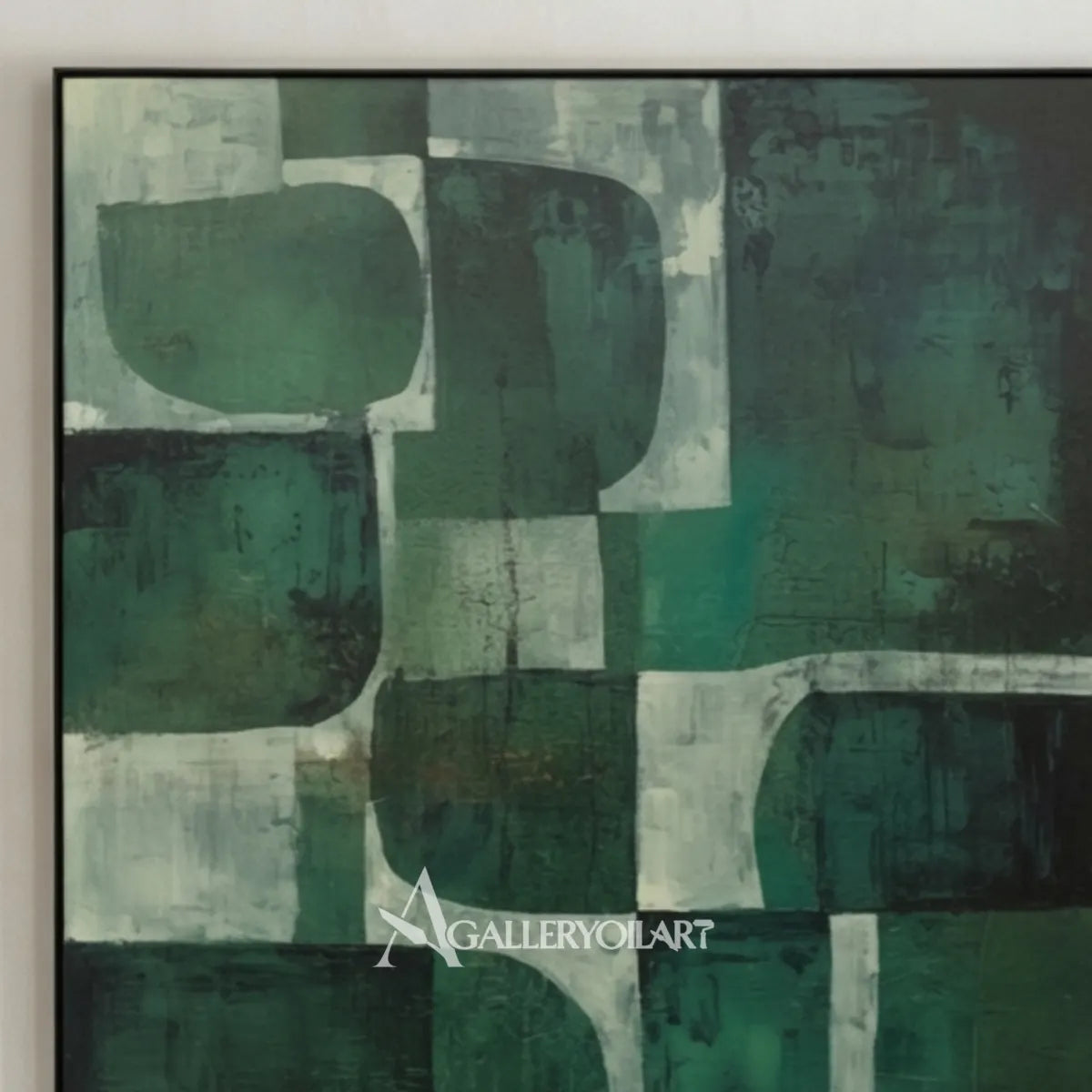 Close view of abstract green and teal geometric blocks wall art