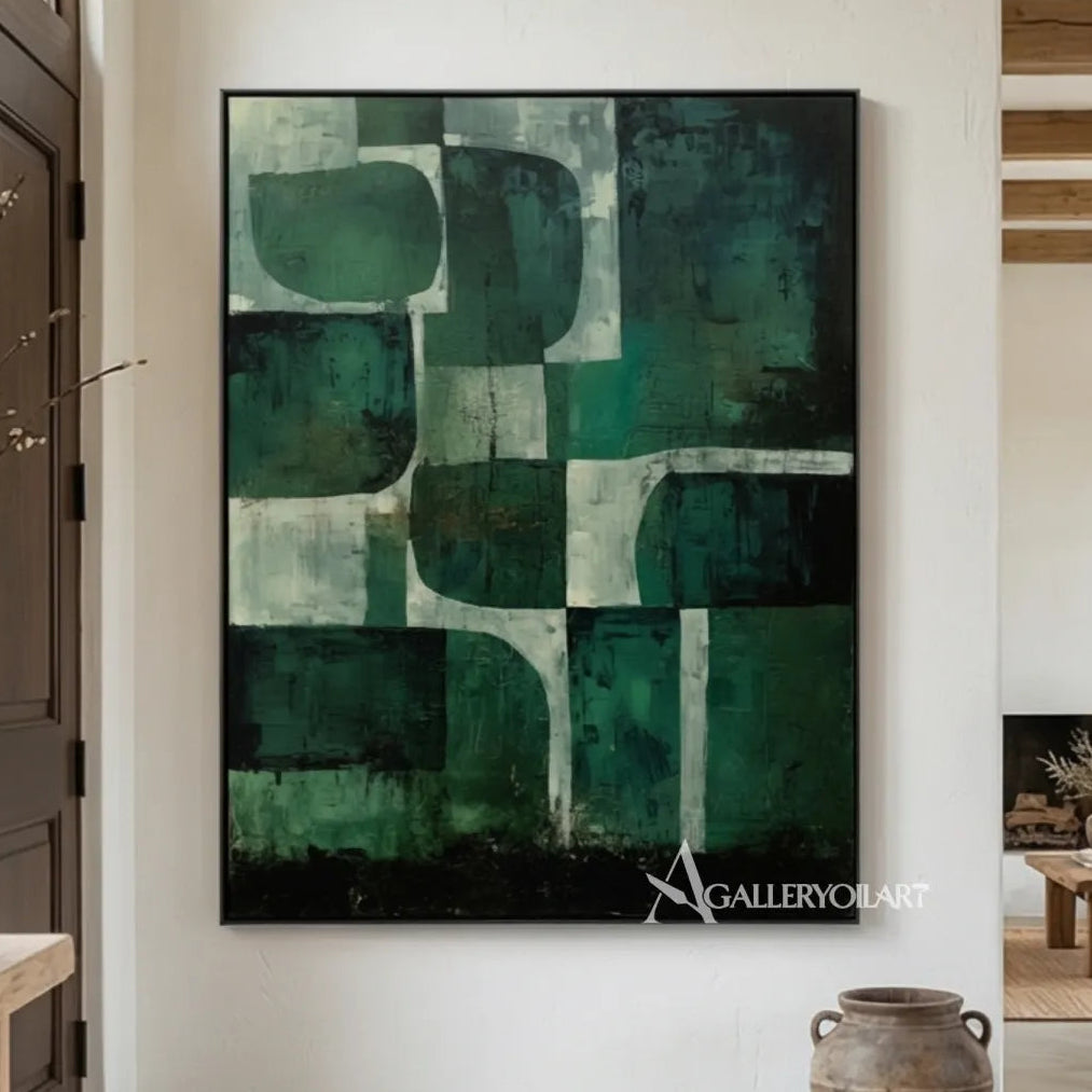 Abstract green and teal geometric blocks wall art in a modern interior