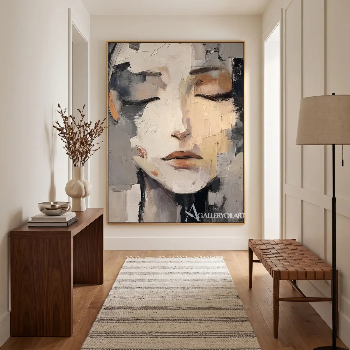 close-up-of-a-resting-woman-face-portrait-art-gray-and-ivory-wall-art-in-a-bright-entryway