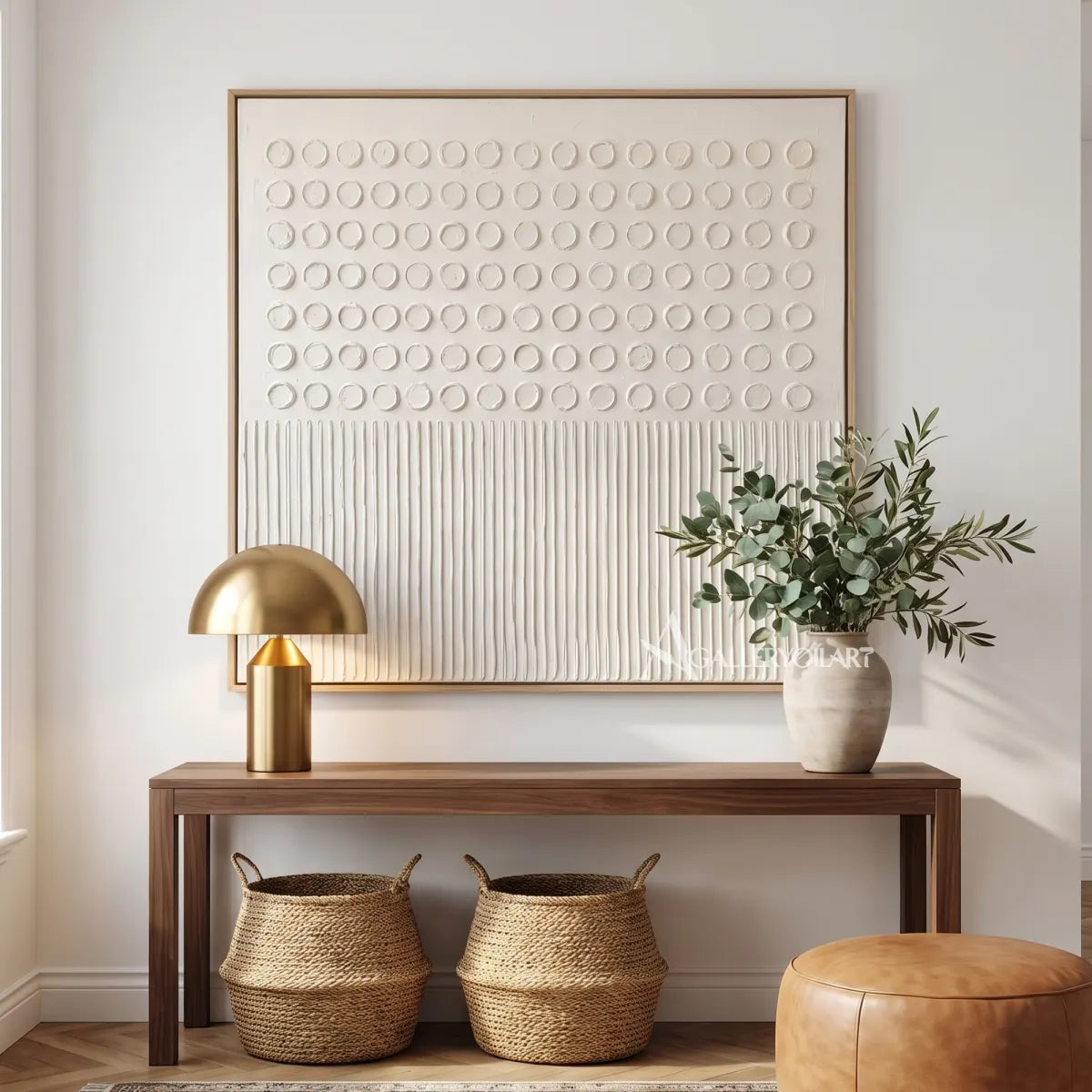 abstract-art-sculpted-circles-and-lines-above-an-entryway-console