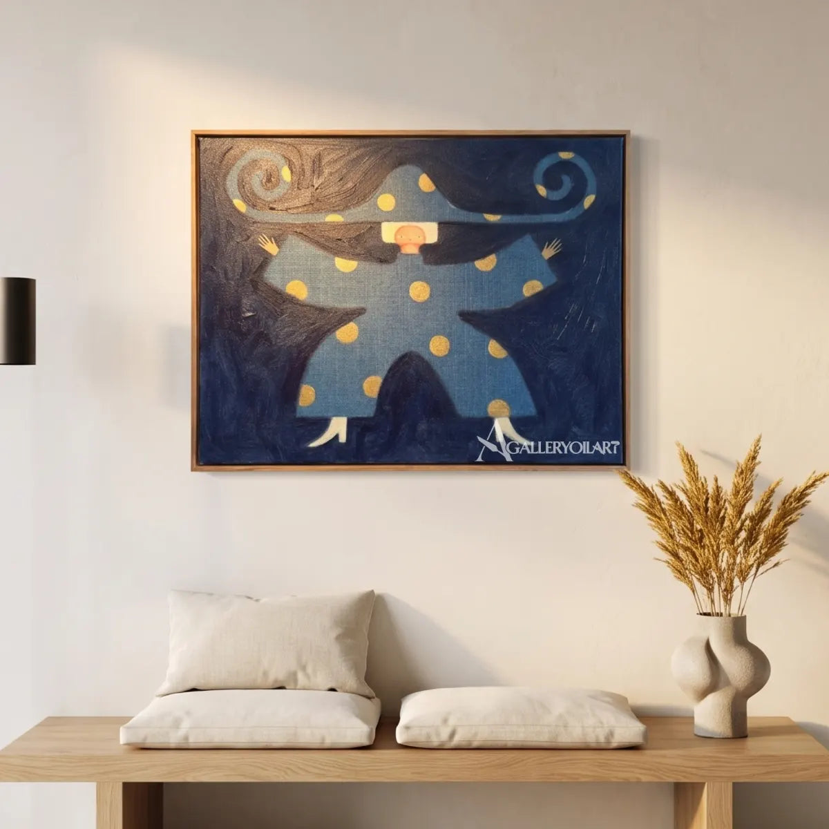 folk-art-figure-above-a-low-sofa-in-a-neutral-sitting-room-with-blue-and-gold-accents