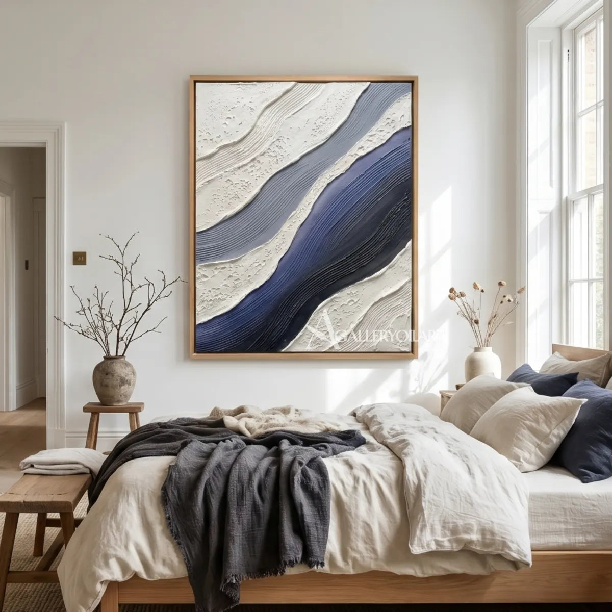 flowing raised bands sweeping diagonally across the canvas in blue and ivory textured 3d art wall art in a entryway setting