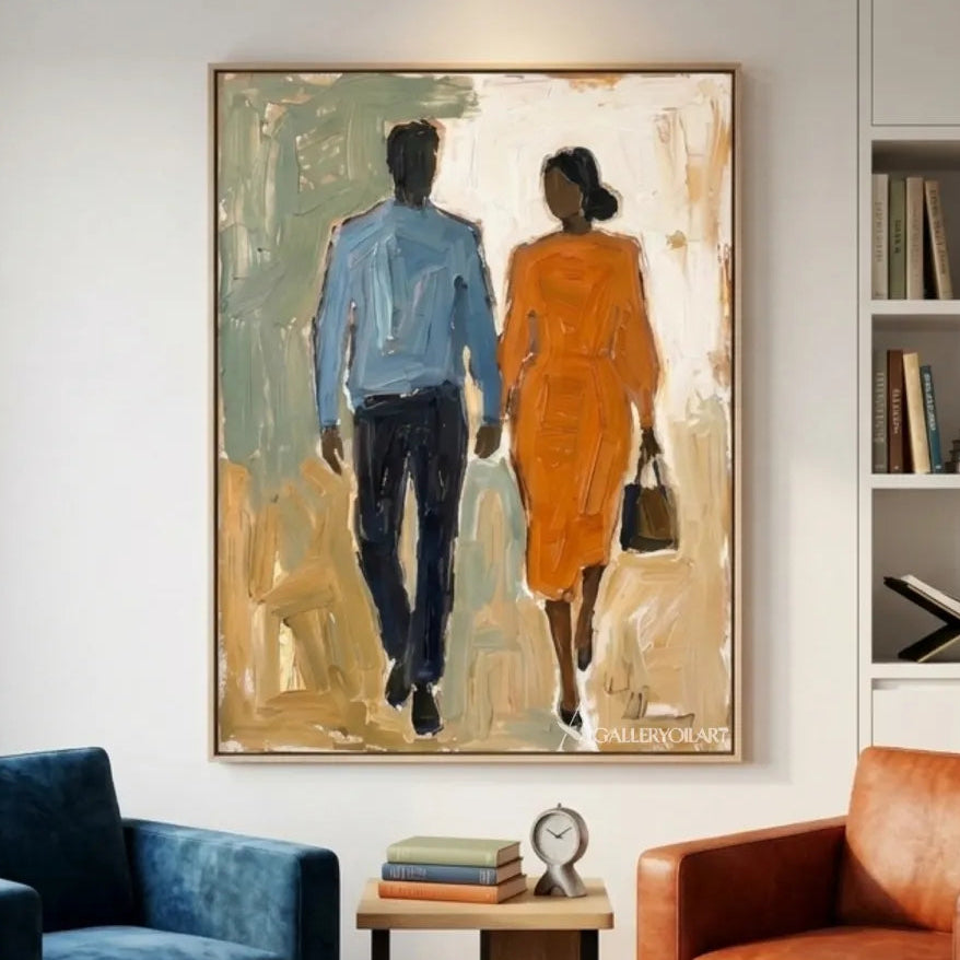 Two-walking-figures-in-blue-and-orange-portrait-art-between-blue-and-rust-colored-seating