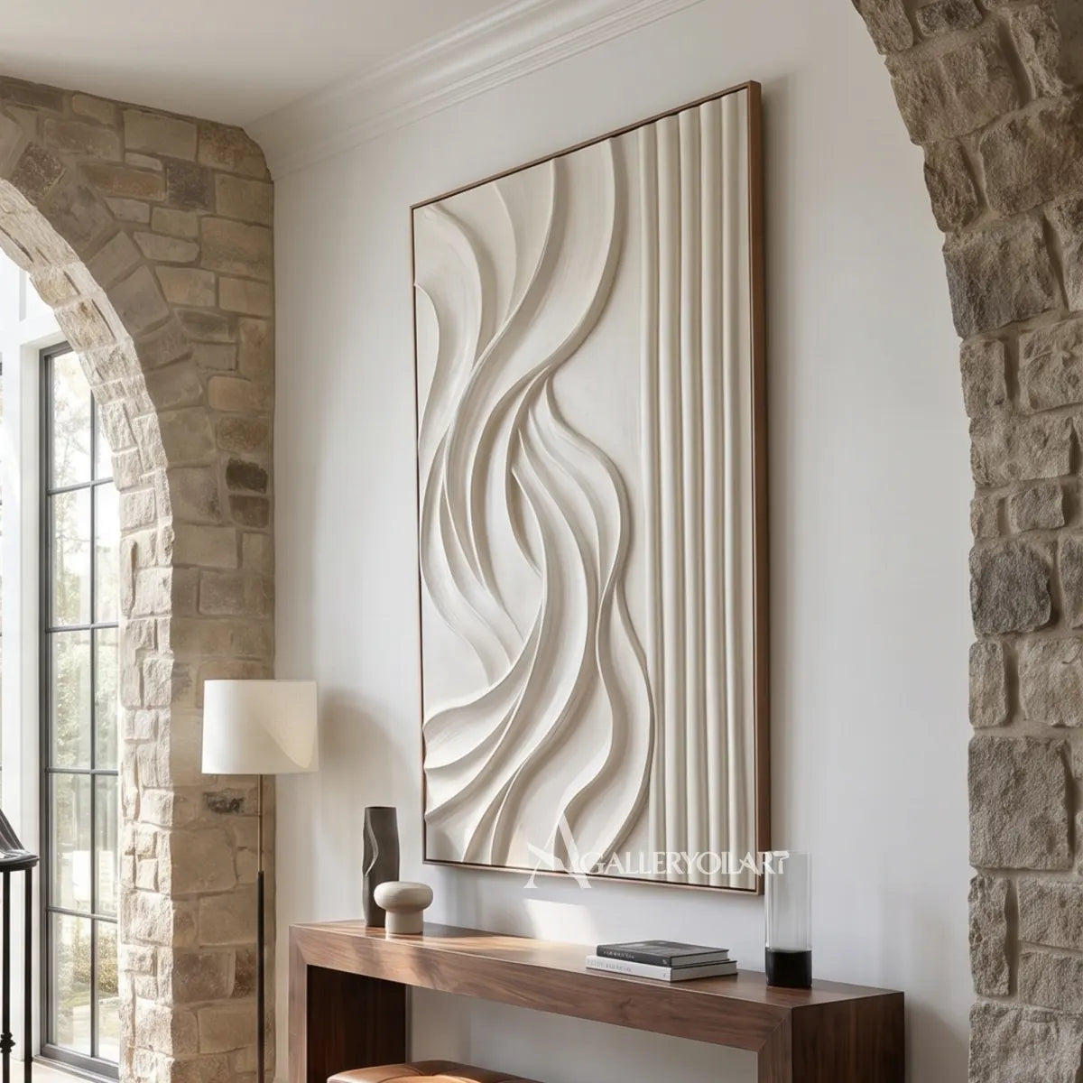 Textured-3D-white-flowing-wave-relief-painting-in-a-stone-accent-interior