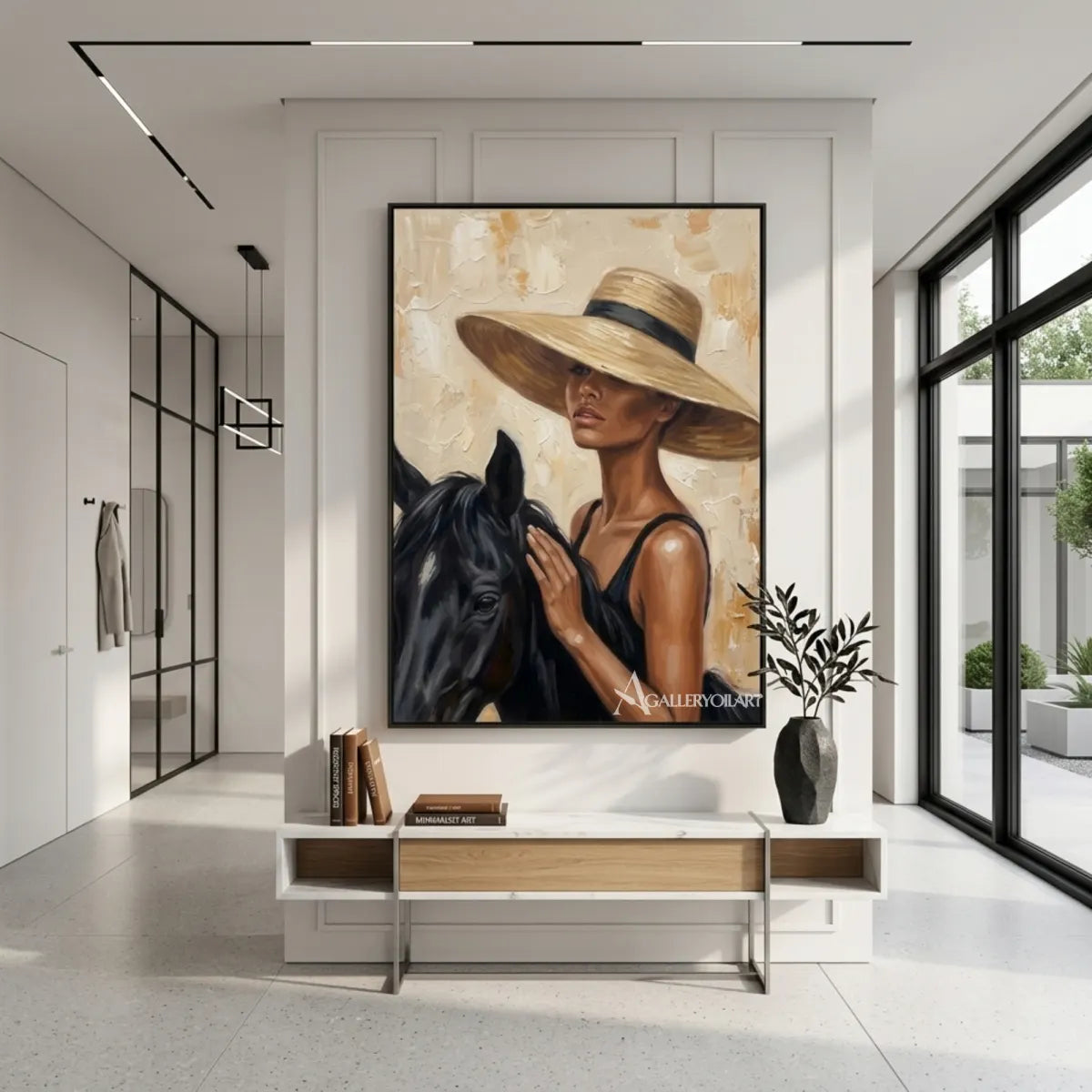 Woman-in-a-wide-brimmed-hat-with-a-black-horse-portrait-art-in-a-modern-entryway-with-brown-and-cream-tones