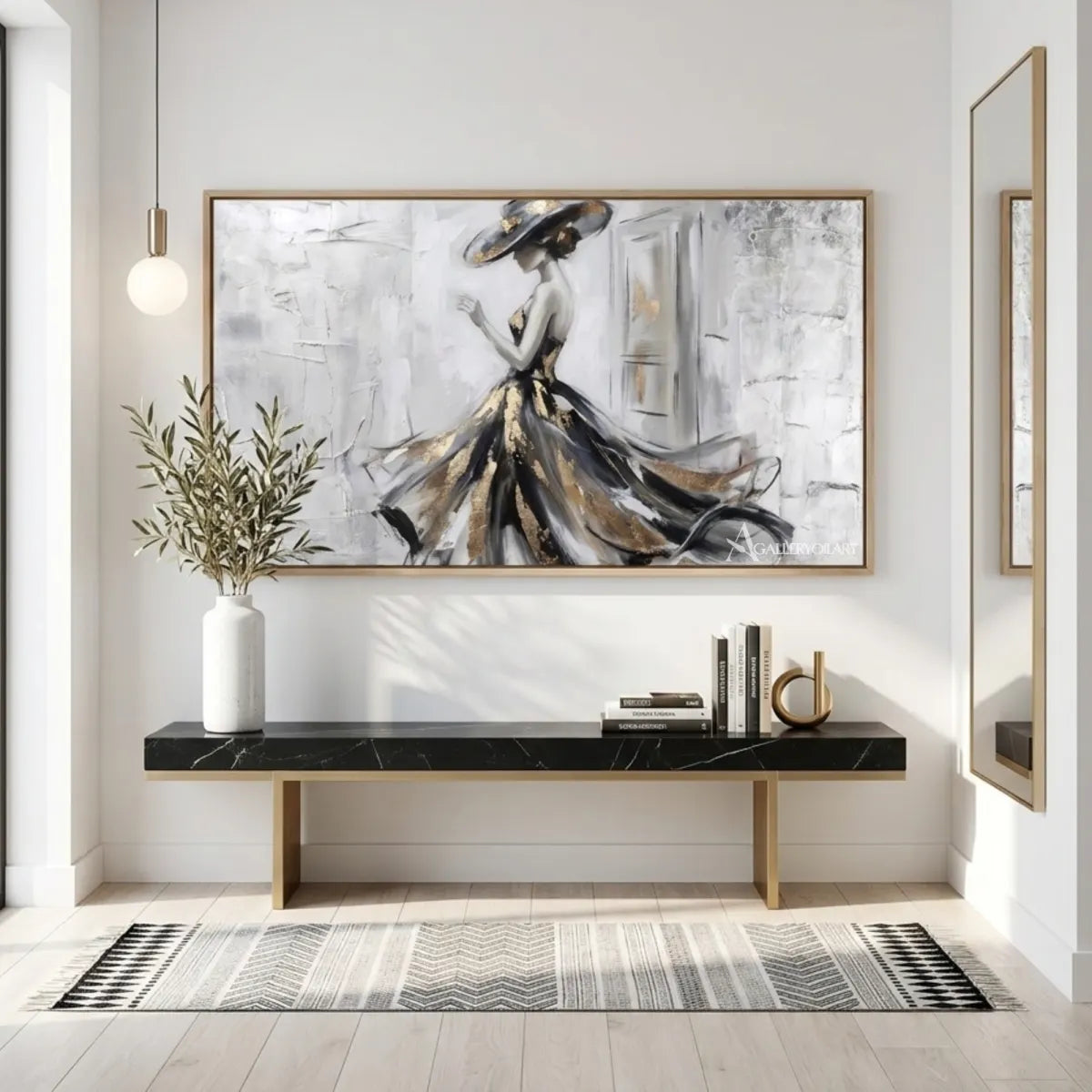 Portrait painting of a woman in a flowing black and gold gown displayed in a modern-entryway