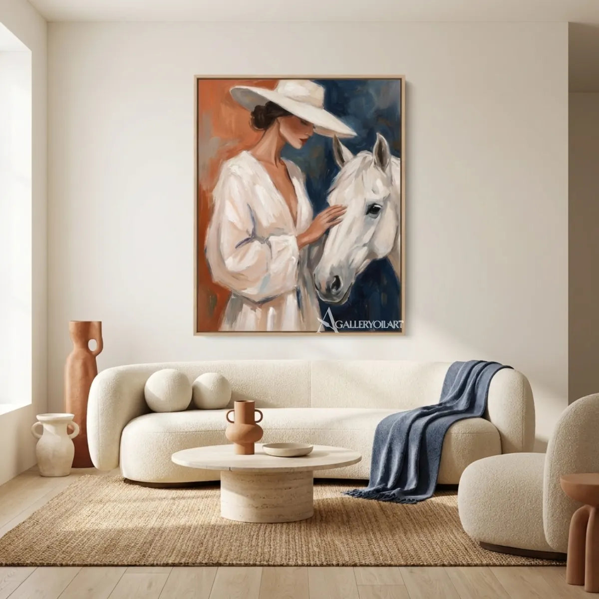 Woman-in-a-white-hat-gently-touching-a-white-horse-with-blue-and-rust-brushwork-in-neutral-living-room