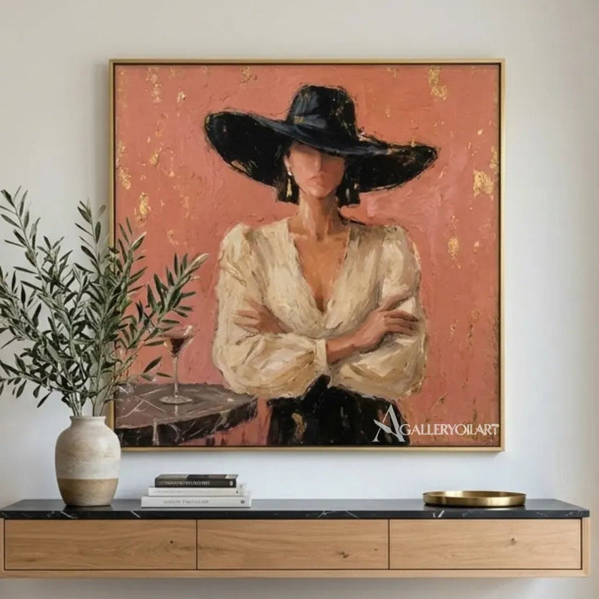 woman-in-a-sweeping-black-hat-and-pale-blouse-in-pink-portrait-art-displayed-in-a-entryway