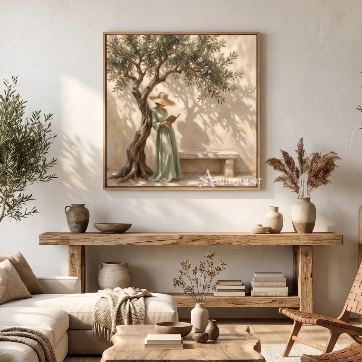 A woman in a sage dress reads beneath an olive tree in square Portrait Art above a rustic console, with beige and green tones