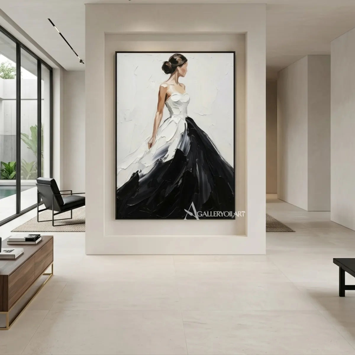 Woman-in-a-flowing-black-and-white-gown-in-portrait-art-displayed-in-a-minimalist-foyer