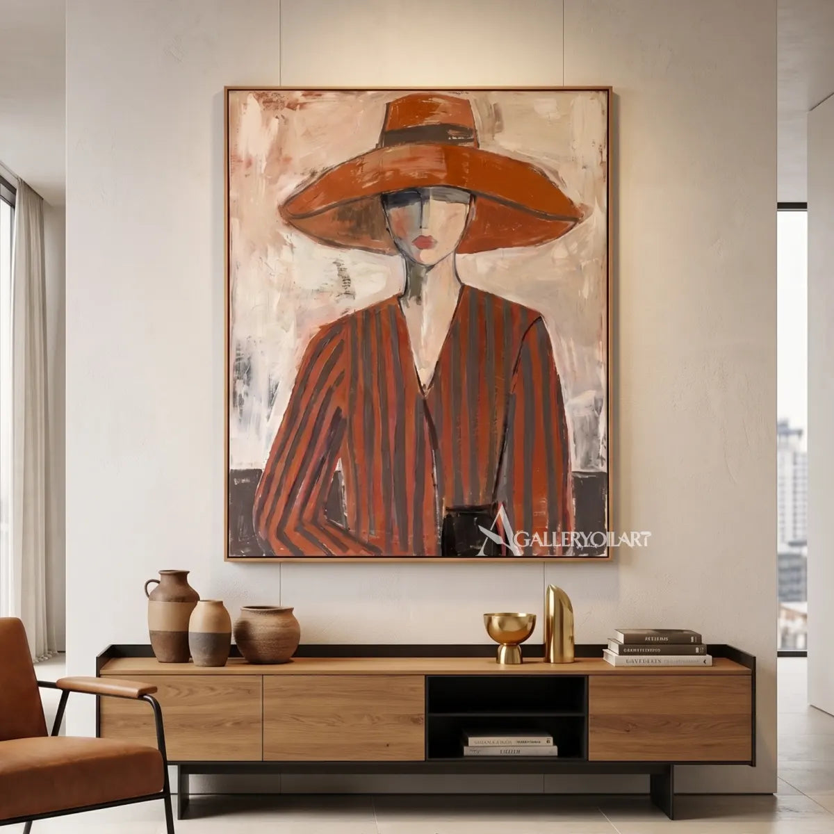 portrait-art-painting-of-a-woman-in-a-wide-brimmed-hat-and-striped-blouse-in-rust-brown-and-cream-in-a-minimalist-interior