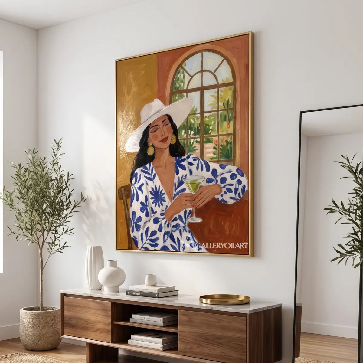Woman-in-a-wide-hat-holding-a-glass-in-blue-accented-portrait-art-displayed-in-a-modern-entryway
