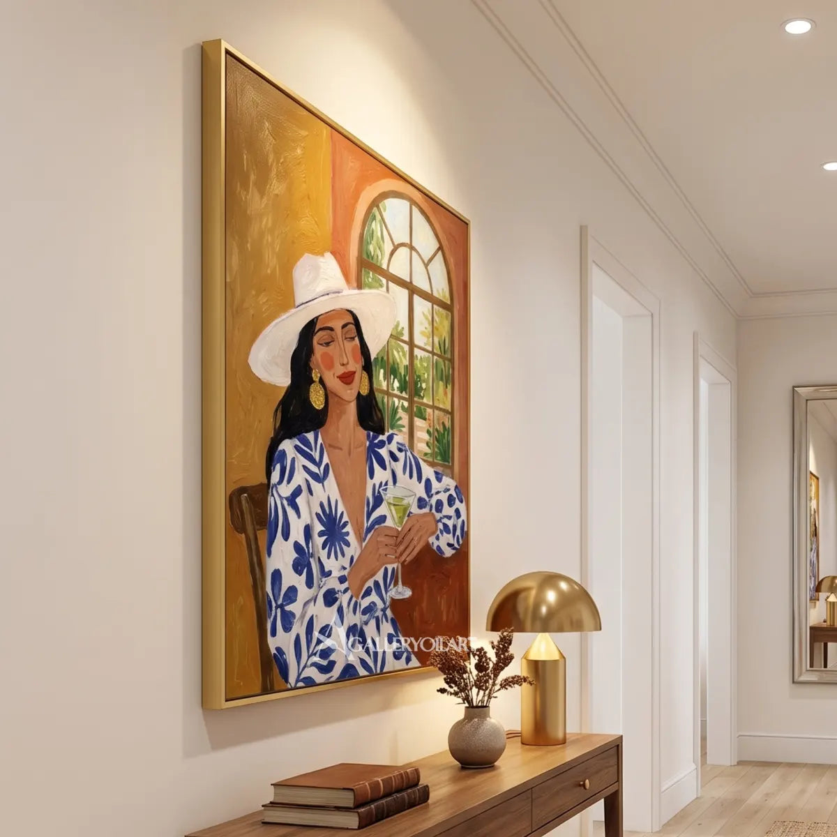 Woman-in-a-wide-hat-holding-a-glass-in-blue-accented-portrait-art-displayed-in-a-transitional-interior