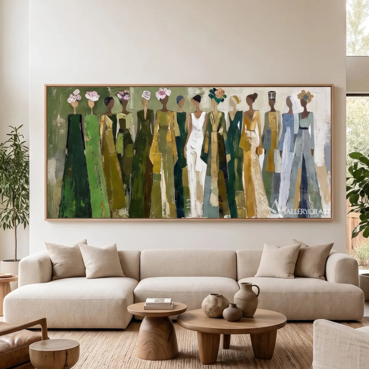 line-of-women-portrait-art-olive-green-and-cream-wall-art-above-a-console-in-a-bright-living-room
